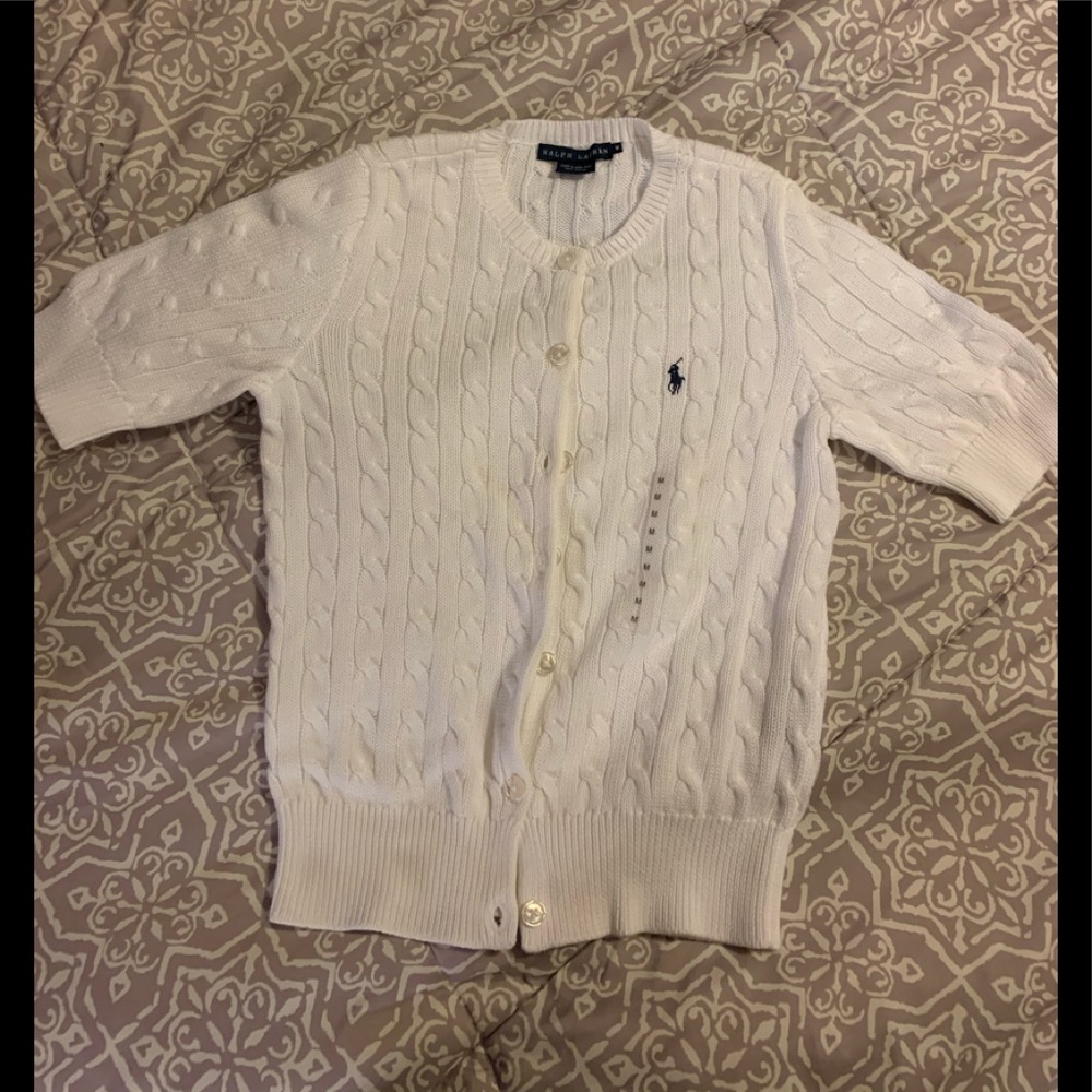 Polo short sleeve sweater. Never worn